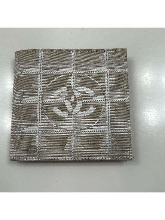CHANEL Handbags - Chanel - Cloth Bifold wallet - great condition AUTHENTIC